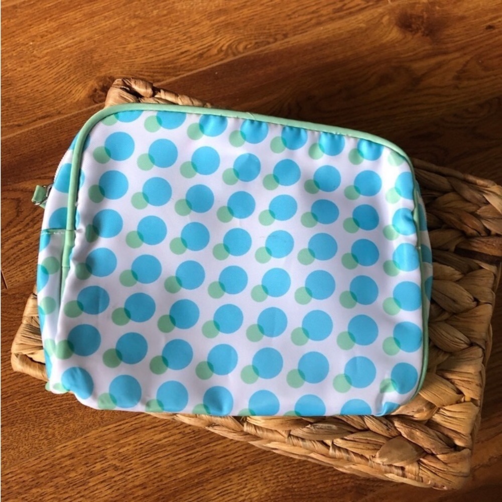 Medium size white and blue polka dot cometic bag